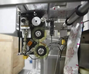 Детали за машината за пакување за заптивки - Печатач за кодирање со лента